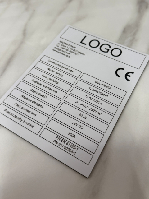 Tabliczka znamionowa zgodna z normami PN-EN 61439-1 i PN-EN 60204-1 | laminat biały | 104x135 mm Tabliczka znamionowa zgodna z normami PN-EN 61439-1 i PN-EN 60204-1 | laminat biały | 104x135 mm